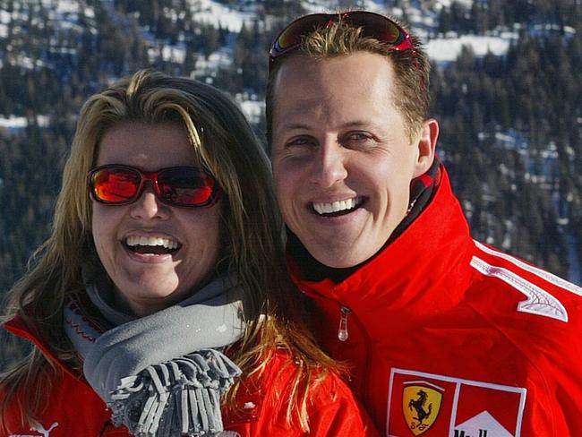 German Formula 1 driver Michael Schumacher poses with his wife Corinna, in the winter resort of Madonna di Campiglio, in the Dolomites area, Northern Italy, 11 January 2005. Schumacher takes part in the traditionnal Ferrari winter meeting with the press. AFP PHOTO / Press Ferrari / AFP PHOTO / FERRARI PRESS OFFICE / STR