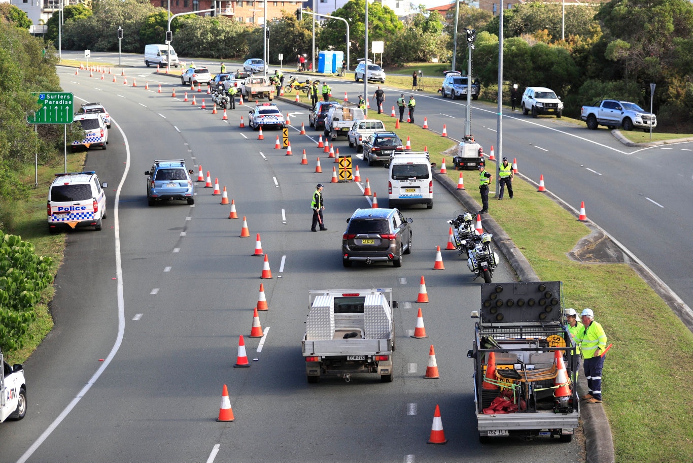 Queensland Police set up a road block due to the Corona Virus at the NSW / Queensland Border on the old Pacific Highway at Coolangatta. Photo: Scott Powick Newscorp