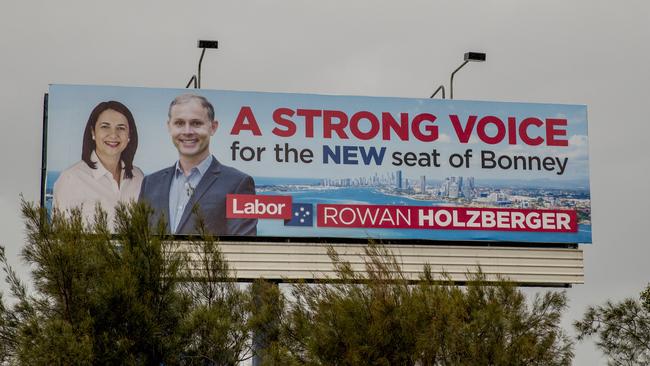 Labor candidate Rowan Holzberger has put up a billboard out the front of Federal Member for Fadden Stuart Robert's office in Labrador. Picture Jerad Williams