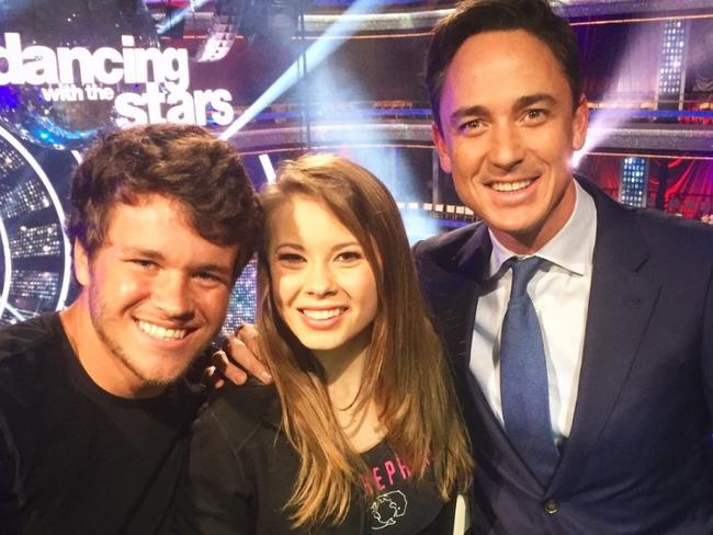 Bindi Irwin, centre, with boyfriend Chandler Powell (left) co-hosting Dancing with the Stars All Access in the US. Picture: Twitter.