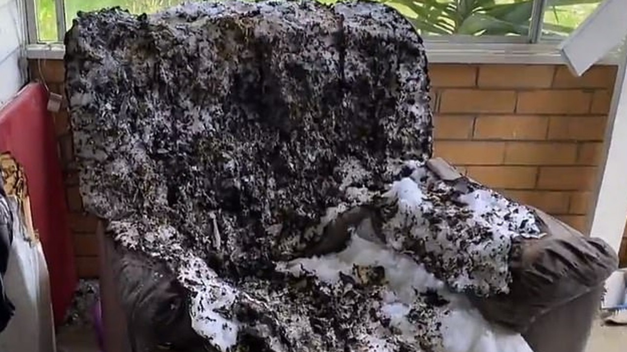 Footage from inside the family home shows a burnt armchair. Picture: Nine News