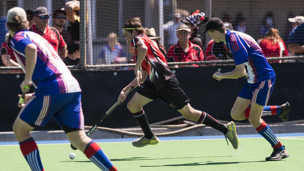 William Ready (centre) of Past High against Rangeville. Picture: Kevin Farmer