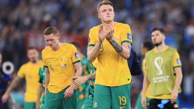 DOHA, QATAR - DECEMBER 03: Harry Souttar of Australia applauds fans after the 1-2 loss during the FIFA World Cup Qatar 2022 Round of 16 match between Argentina and Australia at Ahmad Bin Ali Stadium on December 03, 2022 in Doha, Qatar. (Photo by Buda Mendes/Getty Images)