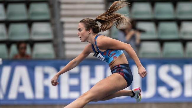 Isabella Guthrie from Mount Kuring-Gai cruises through her heat at the championships. She went on to win a gold medal in the 400m hurdles.