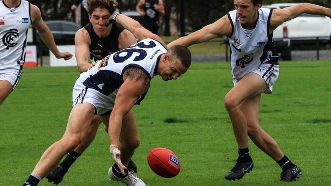 Croydon playing-coach Rhett Jordon hunts the footy. Picture: Davis Harrigan