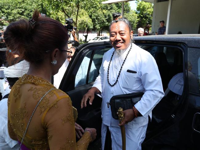 The Balinese  Hindu High Priest arrives to conduct the farewell ceremony. Picture: Liam Kidston.