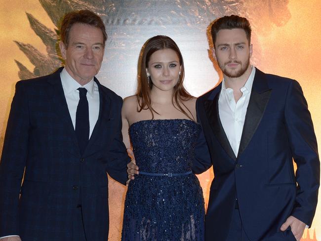 Bryan Cranston, Elizabeth Olsen and Aaron Taylor-Johnson during the UK premiere of Godzilla yesterday.