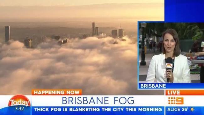 Brisbane’s CBD blanketed by fog