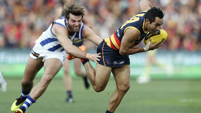 FAST EDDIE: Crows star Eddie Betts breaks away from Kangaroo Luke McDonald at Adelaide Oval on Sunday. Picture: Sarah Reed.