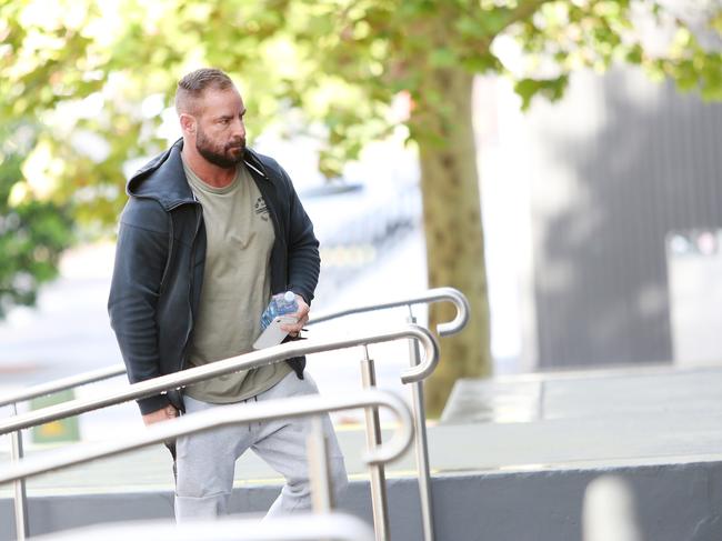 Molloy of the Gold Coast arriving at Wyong Local Court. (AAP Image/Sue Graham)