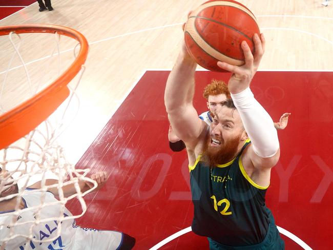 Aron Baynes attacks the rim during the Tokyo Olympics. Picture: Getty Images