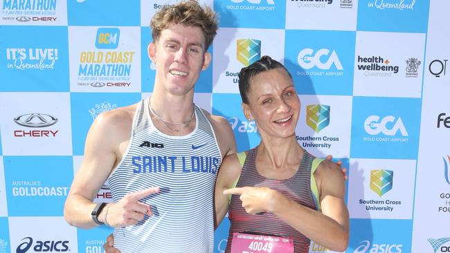 Gold Coast Marathon 2023 5km fun run winners Harrison Martinenko (left) and Olga Firsova. Picture: Richard Gosling