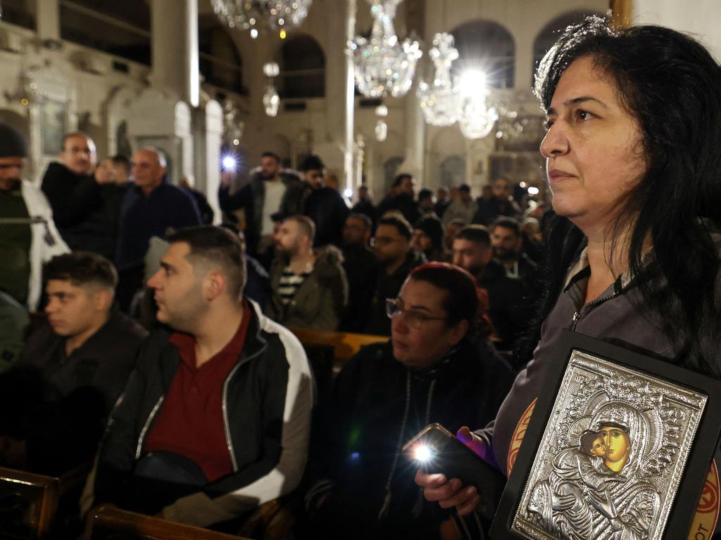 Worshippers chanted “We will sacrifice our souls for our cross,” Picture: AFP