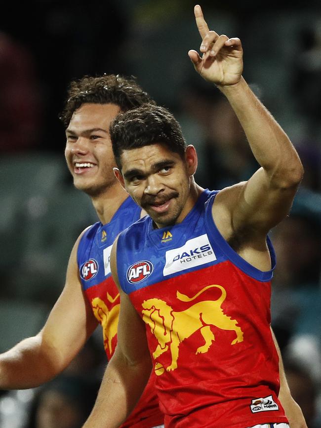 Charlie Cameron signals to the crowd after his goal.