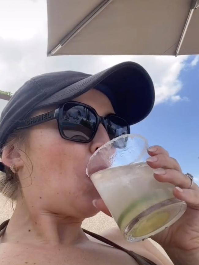 One minute Allana Davison was drinking a cocktail. Picture: TikTok/allanaramaa