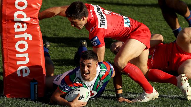 Jamayne Taunoa-Brown scores as the Warriors handed the Dragons a thrashing on Saturday. Picture: Getty Images