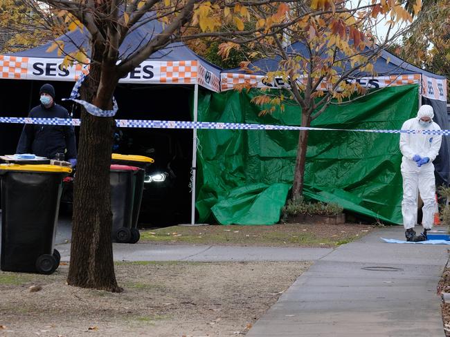 Forensic police and homicide Squad detectives on the scene in Taylors Hill Picture: Luis Enrique Ascui