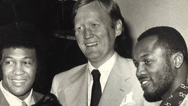 Lord Mayor Ron Walker with boxers Jimmy Ellis and Joe Frazier before a fight in St Kilda in 1975.