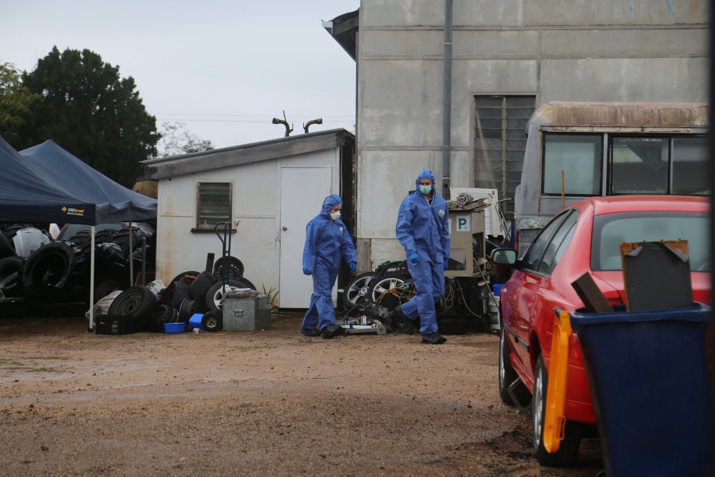 Forensic officers search the scene of the murder. Picture: Tobi Loftus