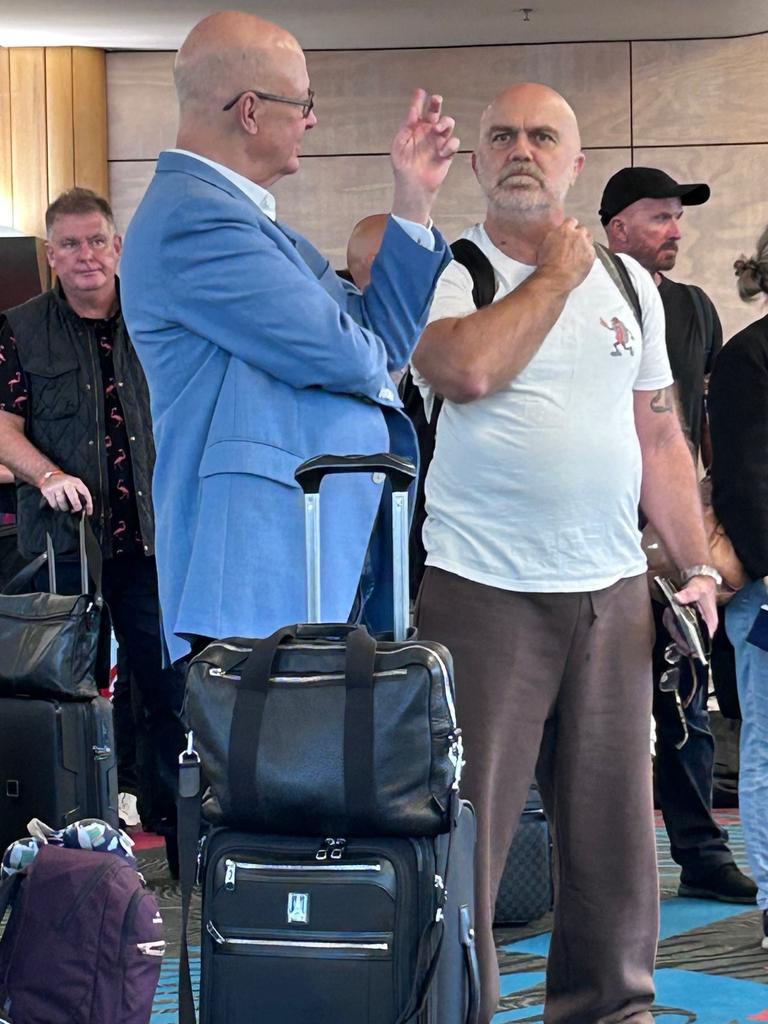 ABC Chair Kim Williams (blue jacket) chatting to a fellow traveller ahead of Qantas flight to NY on May 16