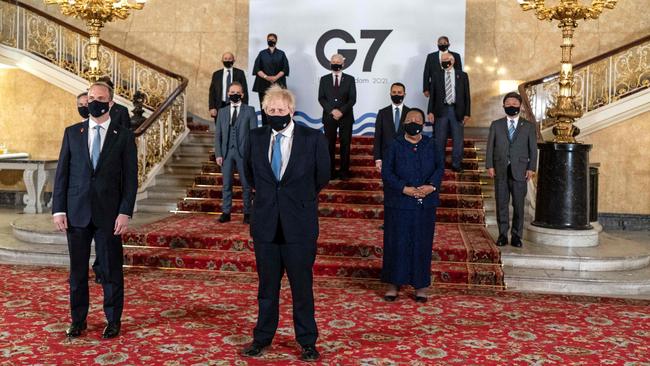 UK Prime Minister Boris Johnson (centre) poses with G7 foreign ministers, including Britain’s Dominic Raab (second from left) and Australia’s Marise Payne (back, left). Picture: AFP