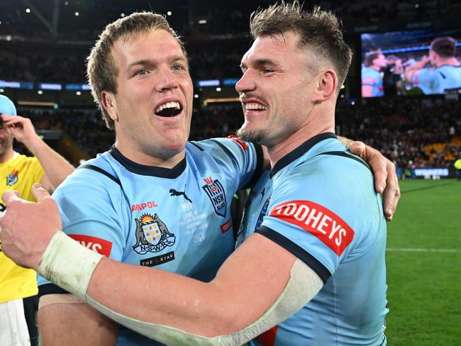 BRISBANE, AUSTRALIA – JULY 17: Jake Trbojevic and Angus Crichton of the Blues celebrate victory following game three of the 2024 Men's State of Origin series between Queensland Maroons and New South Wales Blues at Suncorp Stadium on July 17, 2024 in Brisbane, Australia. (Photo by Bradley Kanaris/Getty Images)