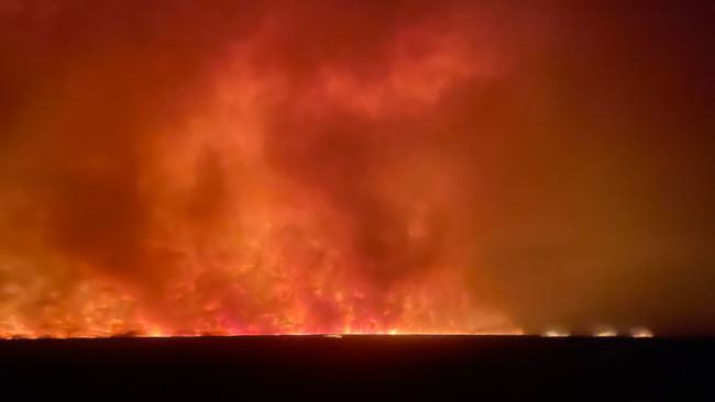 An uncontrolled blaze continues to burn in the Barkly region, with the fire triple the size of the Australian Capital Territory.