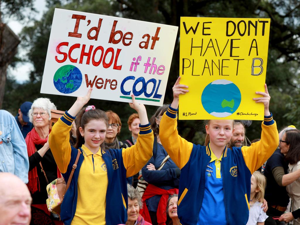 DAILY TELEGRAPH/AAP. Climate Emergency Student Activists Jasmine Vogel 12 and Olivia Mountain 12 from Faulconbridge Public School, protest at the climate emergency student strike in Springwood on Friday 20 September, 2019. The Macquarie Electorate Student Activists (MESCA) are leading students of the Blue
Mountain and Hawkesbury area to strike for the Climate Emergency. (AAP IMAGE / Angelo Velardo)