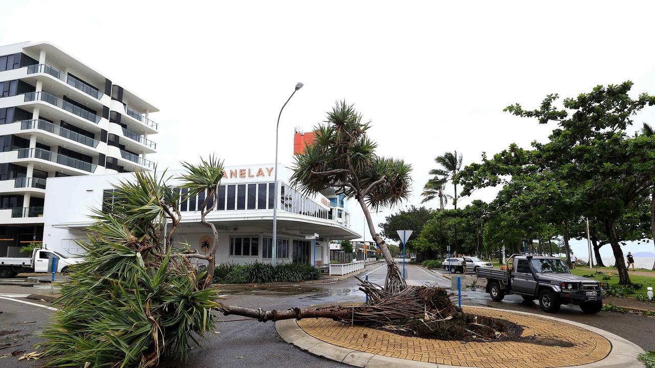 Townville locals woke early to inspect the damage along The Strand left from TC Kirrily that hit overnight. Picture: Adam Head