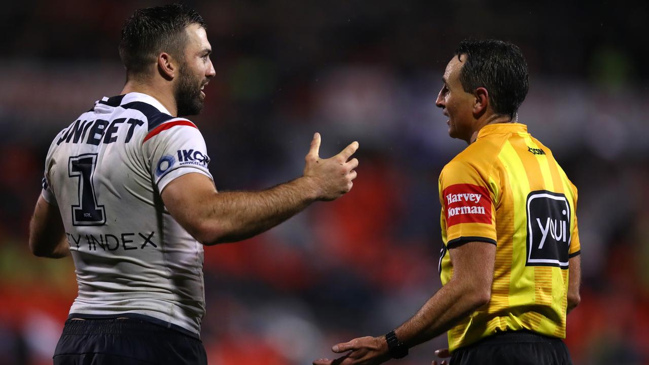 James Tedesco and referee Gerard Sutton. Picture: Jason McCawley/Getty