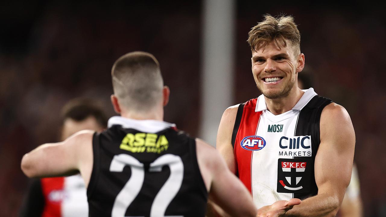 MELBOURNE . 01/04/2023. AFL Round 3. St Kilda vs Essendon at the MCG. Mason Wood of the Saints congratulates Jack Higgins on a last qtr goal . Pic: Michael Klein