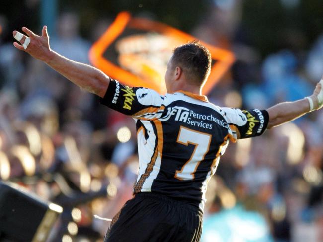 31 Jul 2005 : Cronulla Sharks vs Wests Tigers @ Shark Park : Tigers' Scott Prince celebrates scoring his hat-trick : PicGregg/Porteous - sport Rugby League NRL action