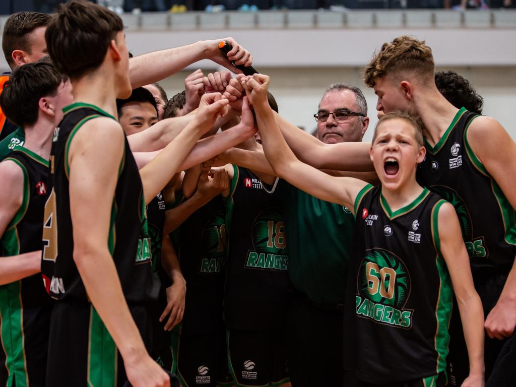 Dandenong Rangers players celebrate after winning the boys championship final during the Basketball Australia Under-14 Club Championships. Picture: Travis Palmieri