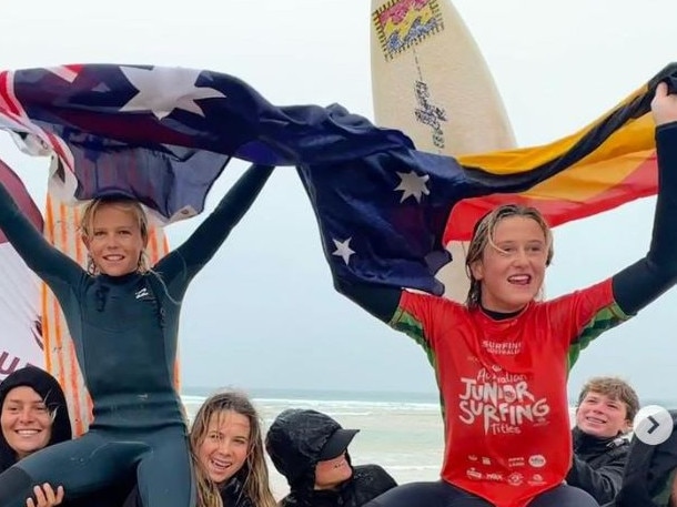 Coffs Harbour brothers Luca and Will Martin are chaired up the beach at Phillip Island after winning the 2023 MR Shield for 16 years and under at the Australian Junior Surfing Titles at Phillip Island.