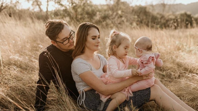 Brendan Tyrrell and his wife Aliesha with their young children.