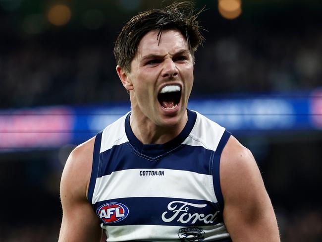 MELBOURNE, AUSTRALIA - JULY 12: Oliver Henry of the Cats celebrates a goal during the 2024 AFL Round 18 match between the Collingwood Magpies and the Geelong Cats at Melbourne Cricket Ground on July 12, 2024 in Melbourne, Australia. (Photo by Michael Willson/AFL Photos via Getty Images)