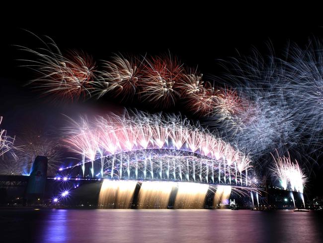 New Year's Eve fireworks light up the sky over Sydney's iconic Harbour Bridge during the fireworks show on January 1, 2022. Picture: Mohammad FAROOQ / AFP.