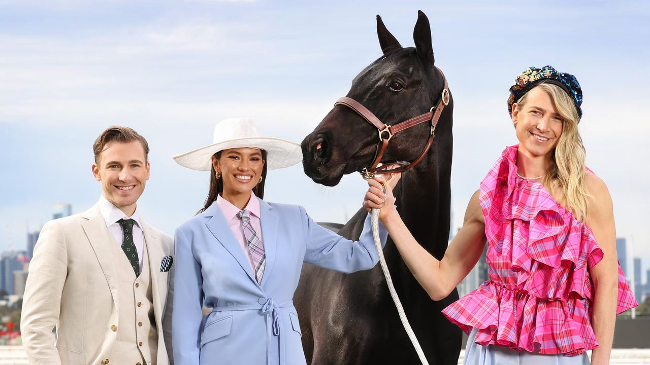 Demi Brereton, Aaron Mitchell and Christian Wilkins with Mr Bean mark the 60th anniversary of Myer Fashions on the Field. Picture: David Caird