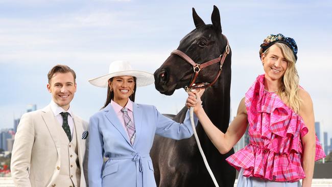 Demi Brereton, Aaron Mitchell and Christian Wilkins with Mr Bean mark the 60th anniversary of Myer Fashions on the Field. Picture: David Caird