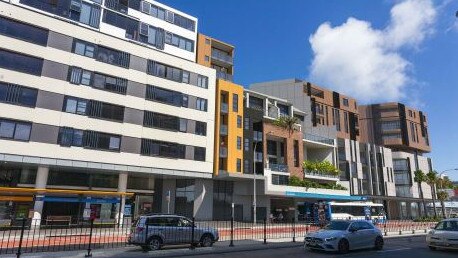 An artist's impression of a 9-storey boarding house development (in yellow) on Pittwater Rd in the Dee Why CBD, which includes 19 rooms of accommodation as well as floors containing commercial offices and a cafe on the ground floor. It was granted approval by the Northern Beaches Local Planning Panel on June 1. Picture: Crawford Architects