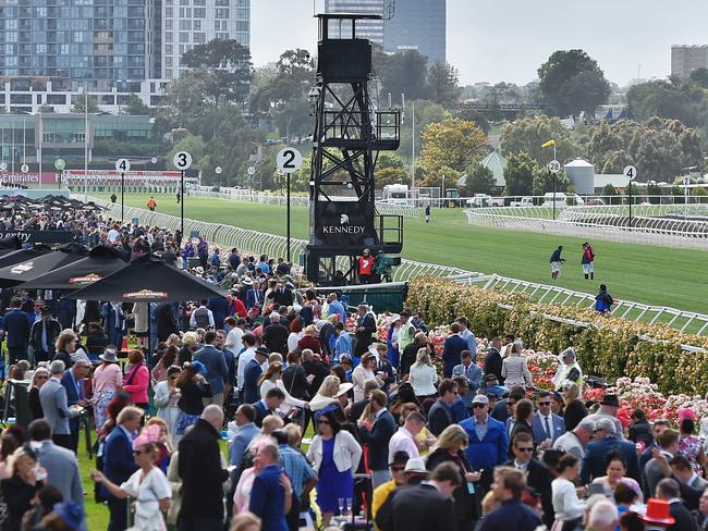 Crowds arrive on a cold 2017 Melbourne Cup at Flemington. Picture: Jason Edwards