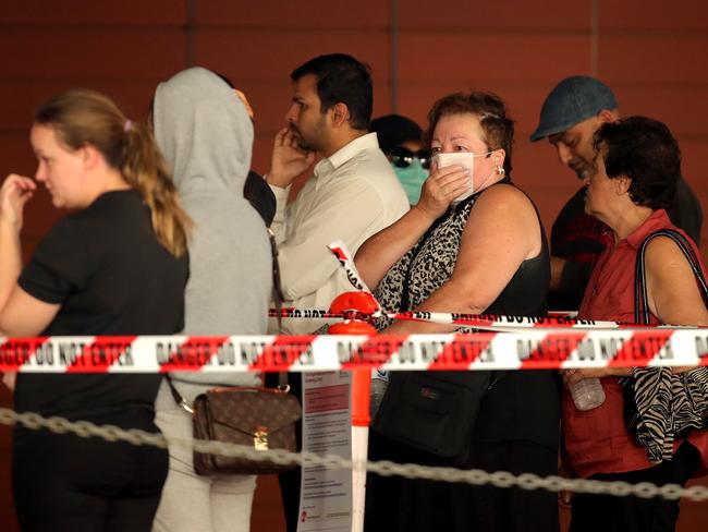 People line up to get tested for coronavirus at the Royal Melbourne Hospital in Melbourne. Picture: Stuart McEvoy