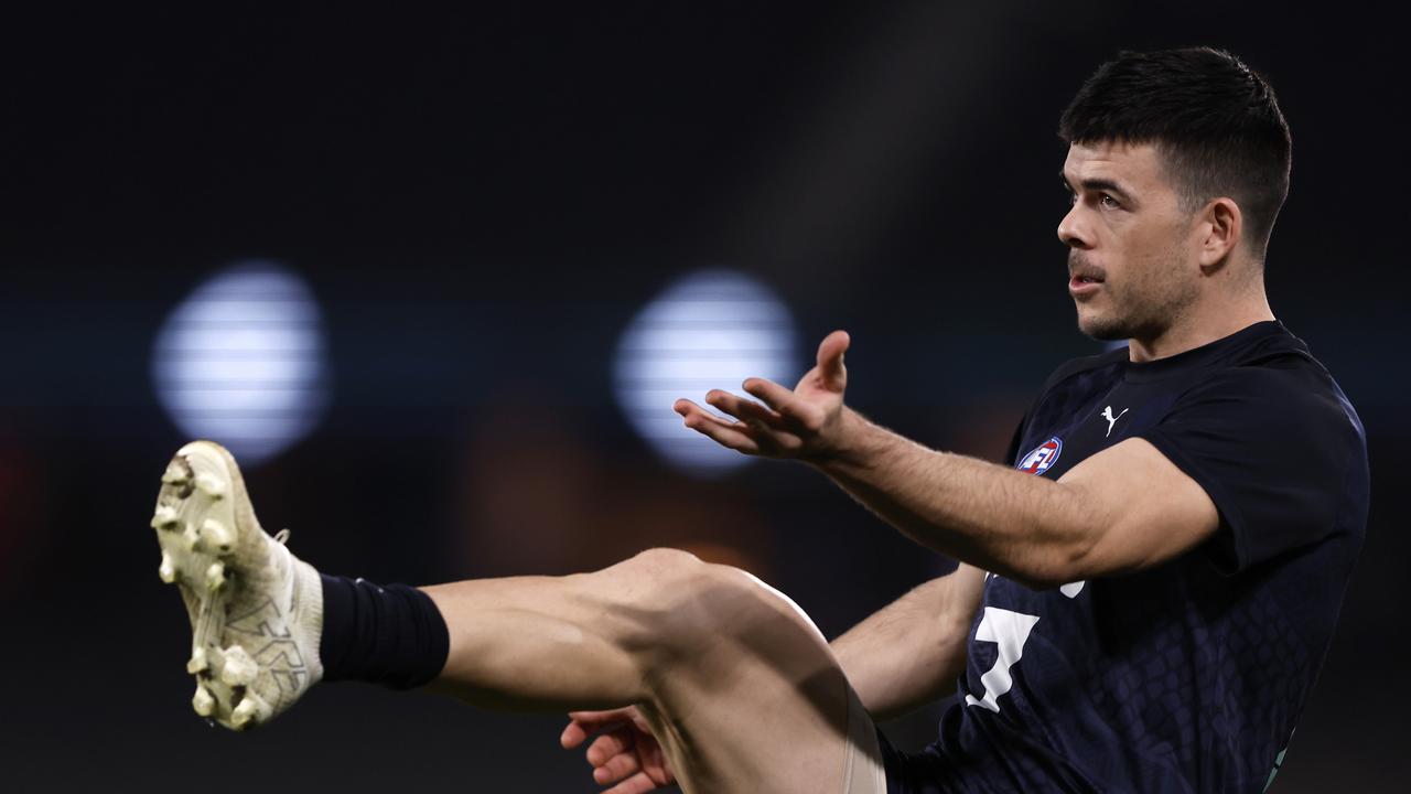 MELBOURNE, AUSTRALIA – JULY 26: Matthew Kennedy of the Blues warms up before before the round 20AFL match between Carlton Blues and Port Adelaide Power at Marvel Stadium, on July 26, 2024, in Melbourne, Australia. (Photo by Darrian Traynor/Getty Images)