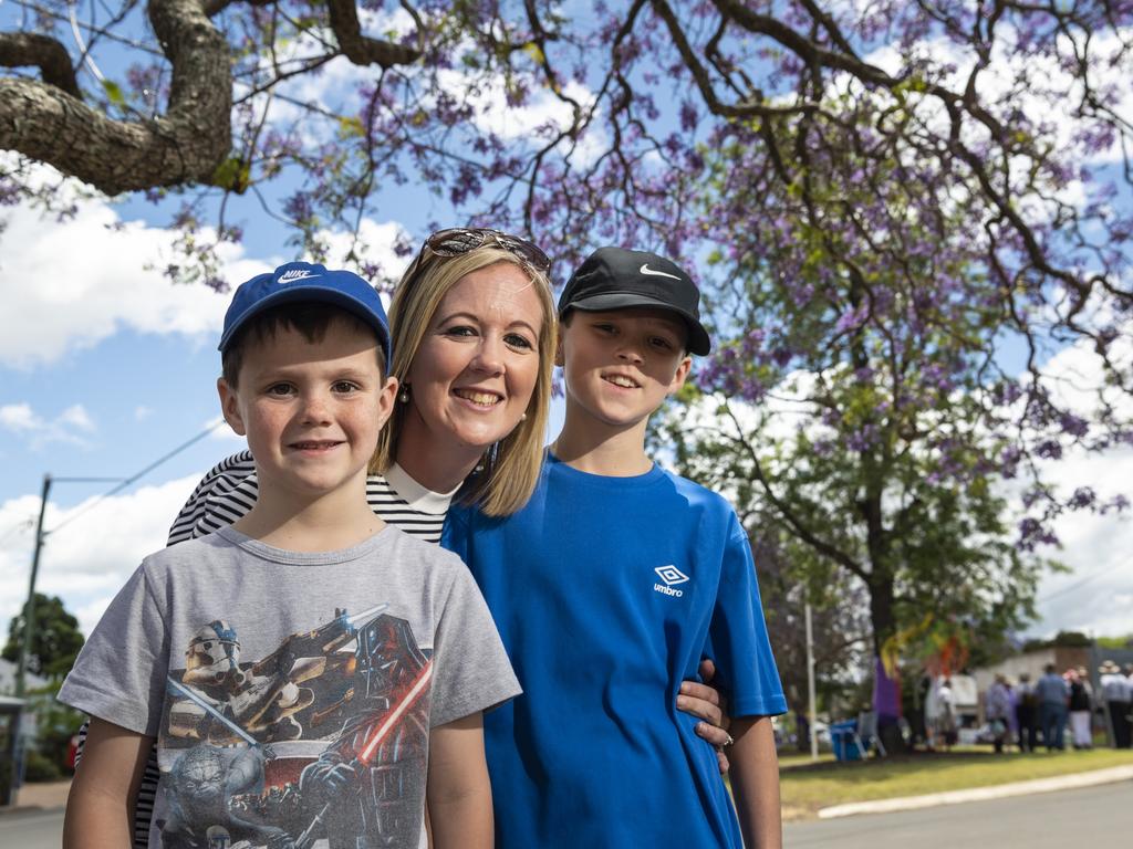 Enjoying all things purple at Jacaranda Day are Lauren Reeves and sons Michael Reeves (left) and Blake Reeves in Goombungee, Saturday, November 5, 2022. Picture: Kevin Farmer