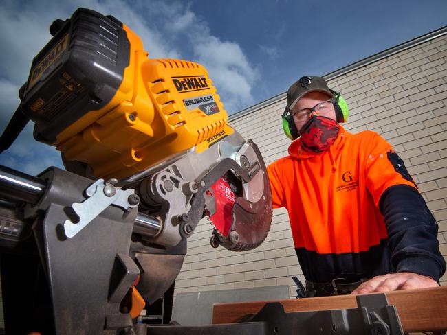 Rebuilding Victoria; Adam Slater, nominee Master Builder Apprentice of the year working on a property in Safety Beach. Picture: Tony Gough