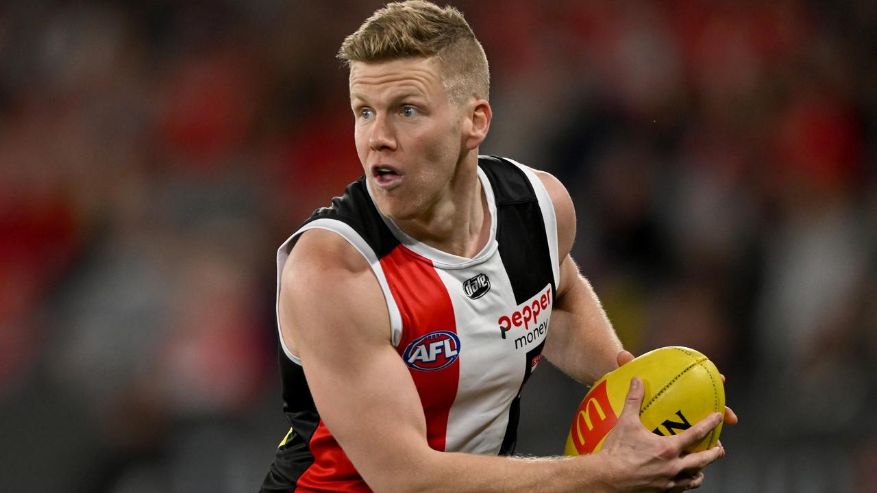 MELBOURNE, AUSTRALIA - AUGUST 21: Dan Hannebery of the Saints runs with the ball during the round 23 AFL match between the St Kilda Saints and the Sydney Swans at Marvel Stadium on August 21, 2022 in Melbourne, Australia. (Photo by Morgan Hancock/AFL Photos/via Getty Images)