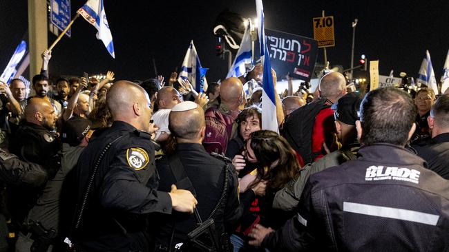 Protesters clash with police officers during a demonstration calling for the release of hostages held in the Gaza Strip and against Israeli Prime Minister Benjamin Netanyahu. Picture: Getty Images.