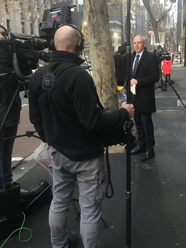 Journalists gather outside court ahead of the George Pell judgment. Picture: John Ferguson