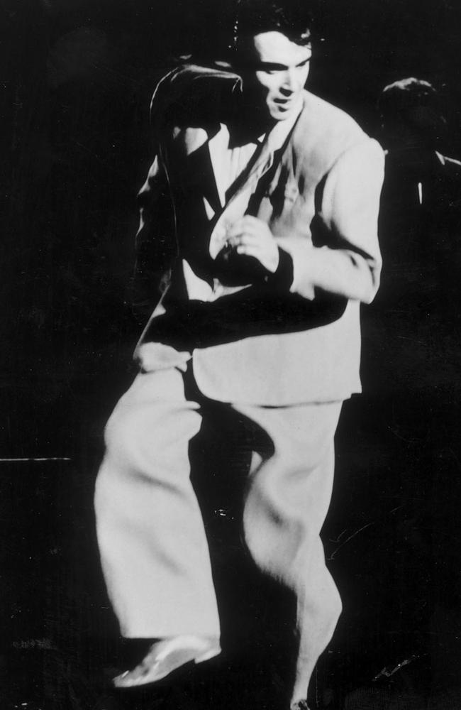 David Byrne performs with the band Talking Heads in scene from the film Stop Making Sense. Picture: Supplied.