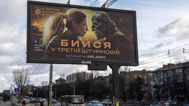 A billboard encouraging Ukrainians to “fight in the 3rd Assault” is part of a promotional campaign for the brigade